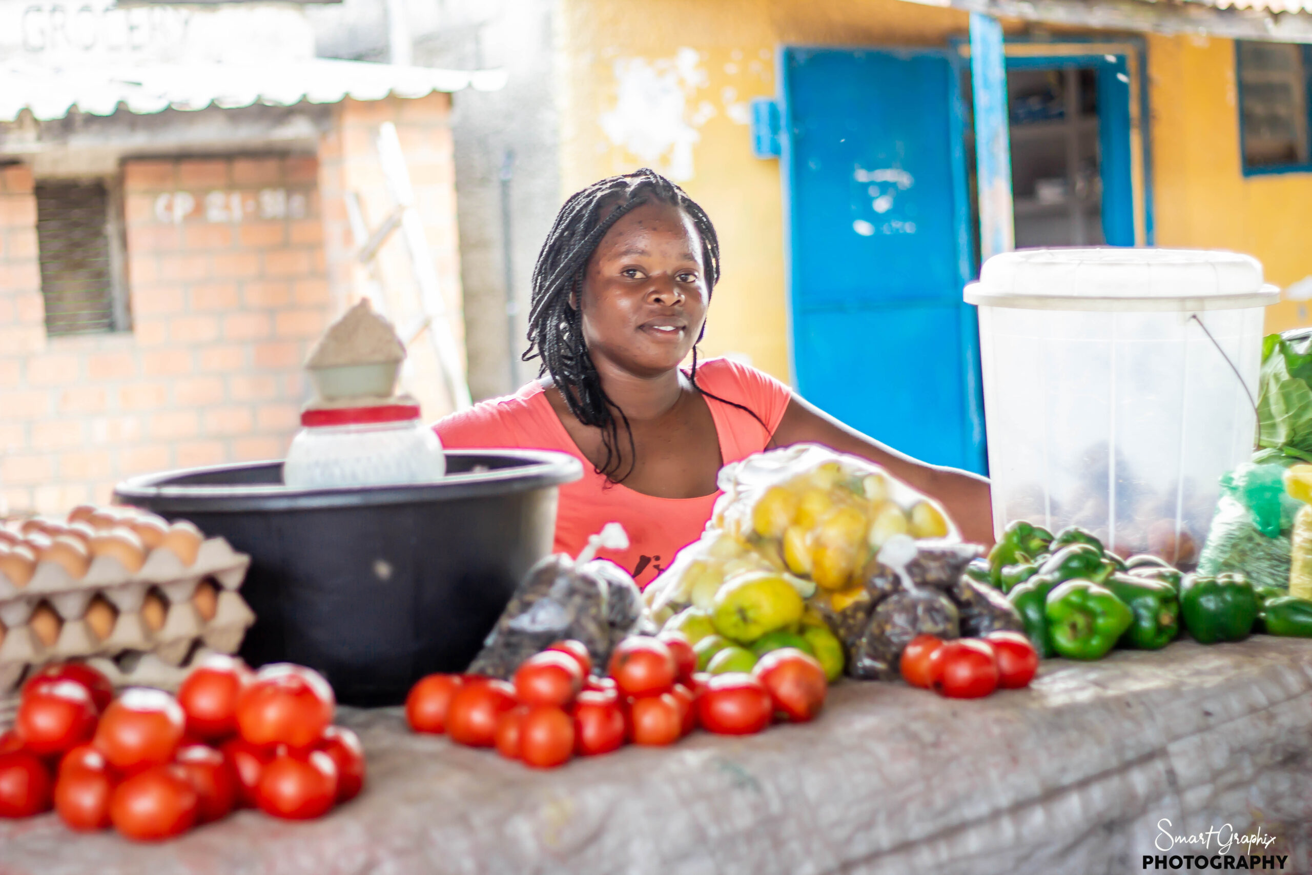 Embrace Her ZM beneficiary selling tomatoes